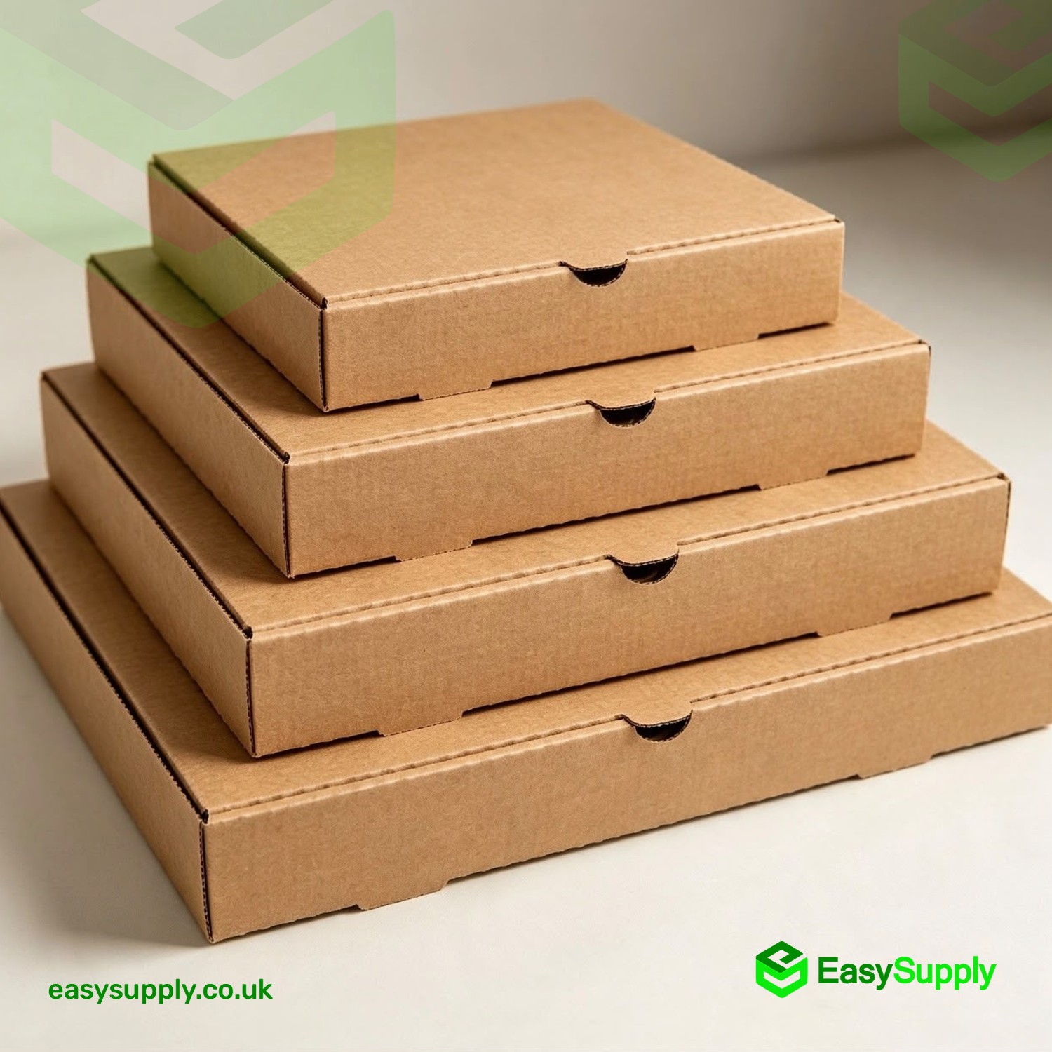 Four brown kraft pizza boxes stacked in a size pyramid